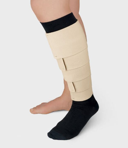 Person wearing the Solaris ReadyWrap Fusion Kit on their left leg in the color beige.