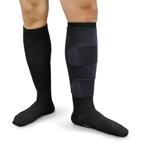 A guy wearing his Therafirm Ease Adjust Velcro Compression Wrap in the color black