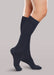Lady wearing her Therafirm EASE Opaque Women's Chevron Trouser Socks 15-20 mmHg compression in the color black