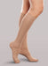 Lady wearing her Therafirm EASE Opaque Women's knee high 30-40 mmHg compression stockings in the color sand