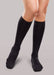 Lady wearing her Therafirm EASE Opaque Women's knee high 30-40 mmHg compression stockings in the color black