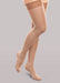 Lady wearing her Therafirm EASE Opaque Women's thigh high 30-40 mmHg compression stockings in the color sand