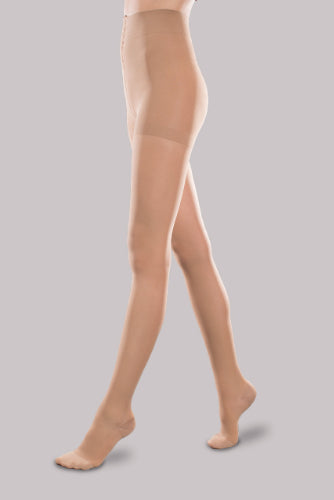 Lady wearing her Ease Sheer 30-40 mmHg compression pantyhose by Therafirm in the color sand