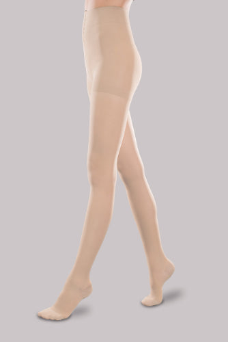 Lady wearing her Ease Sheer 30-40 mmHg compression pantyhose by Therafirm in the color natural