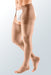 Man wearing his Mediven Plus Thigh High Left Leg with Waist Attachment | 20-30 mmHg Color Beige