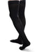 Guy wearing his thigh high Core-Spun 30-40 mmHg Compression Socks in the color Black