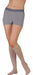 Woman wearing her Juzo Dynamic Closed Toe Knee High 20-30 mmHg Compression Stockings with 5 cm Silicone Dot Band in the color Beige