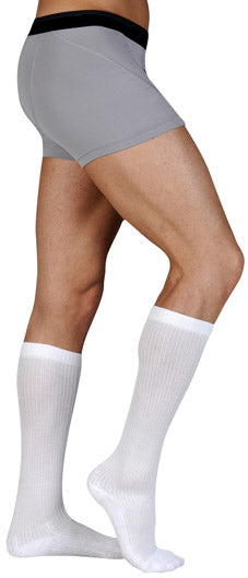 Guy wearing his Juzo Basic Casual 15-20 mmHg Compression Socks in the color White (4700AD06)