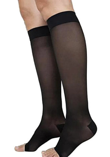 Female leg wearing Sigvaris 782CO Sheer Open Toe Knee High Compression Stockings in the color Black