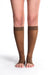 Female leg wearing Sigvaris 782CO Sheer Open Toe Knee High Compression Stockings in the color Mocha