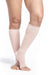 Female leg wearing Sigvaris 782C Sheer Open Toe Knee High Compression Stockings in the color Warm Sand