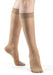 Female legs wearing Sigvaris 783 Sheer Knee High Compression Stockings in the color Golden