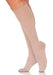 Female legs wearing Sigvaris 783 Sheer Knee High Compression Stockings in the color Honey