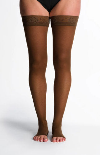Woman wearing Sigvaris Sheer Thigh High Stockings 782NO in the Color Mocha