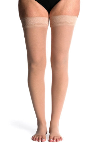 Woman wearing Sigvaris Sheer Thigh High Stockings 782NO in the Color Toasted Almond