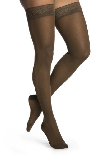 Lady wearing 783N Sheer Compression Thigh Highs in the Color Mocha