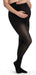 Pragnant woman wearing her Sigvaris maternity Soft Opaque compression stockings in the color Black