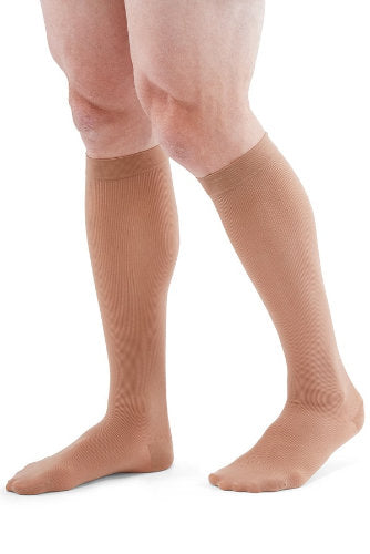 Male wearing his Medi Duomed Patriot Ribbed Compression Socks in the Color Tan