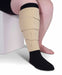 Lady wearing her Circaid JuxtaLite HD velcro compression wrap in the color Beige. 