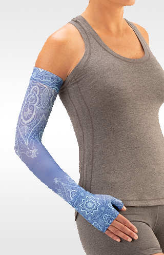 Juzo Soft Arm Sleeve with Silicone Band in the Vintage Blue Print. Available in 15-20 mmHg, 20-30 mmHg and 30-40 mmHg Compression