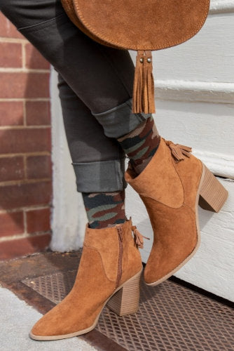 Lady wearing her fun camoflaged Rejuva compression stockings