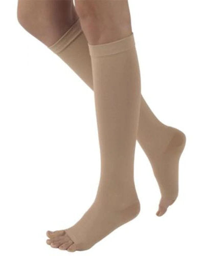 Sigvaris 504C Natural Rubber 40-50 mmHg Compression Open Toe Stockings Color Beige on a Womans leg