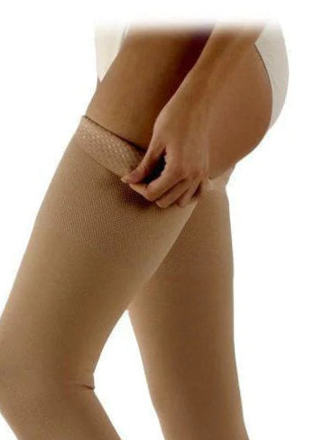 Lady showing the Silicone Dot Band on her Sigvaris 504N Stocking