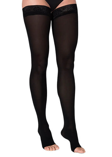 Womans leg wearing the Sigvaris Soft Opaque 841 open-toe compression thigh highs in the color Black