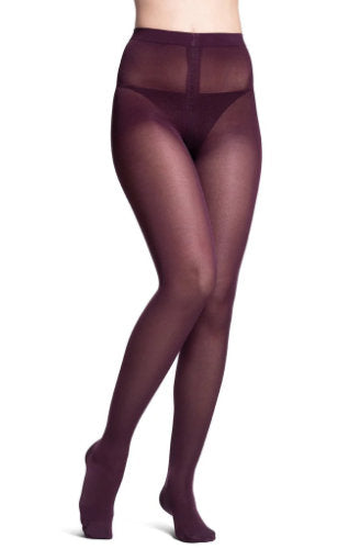 Woman wearing her Sigvaris 841P Soft Opaque 15-20 mmHg Pantyhose in the color Mulberry