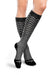 Lady wearing her Patterned Core-Spun 10-15 mmHg compression knee high socks.