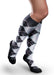Lady wearing her Patterned Core-Spun 10-15 mmHg compression knee high socks.