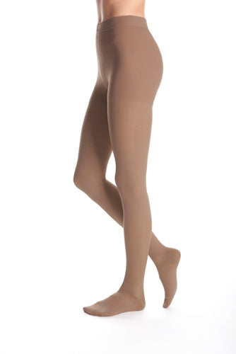 Lady wearing her Mediven Duomed Advantage 20-30 mmHg Compression Pantyhose in the color Almond