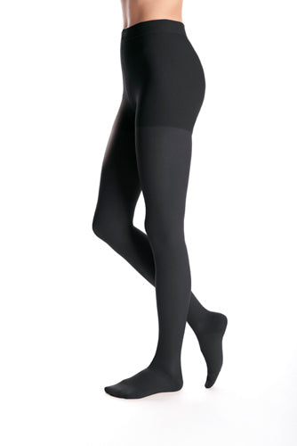 Lady wearing her Duomed Advantage Waist High Compression Stockings by Medi in the color Black
