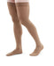 Man wearing Medi Duomed Advantage Thigh High Compression Stockings in the color Almond