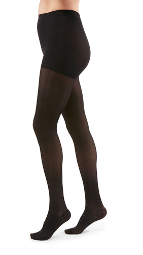 Lady wearing her Duomed Transparent Waist High Compression Stockings in the color Black