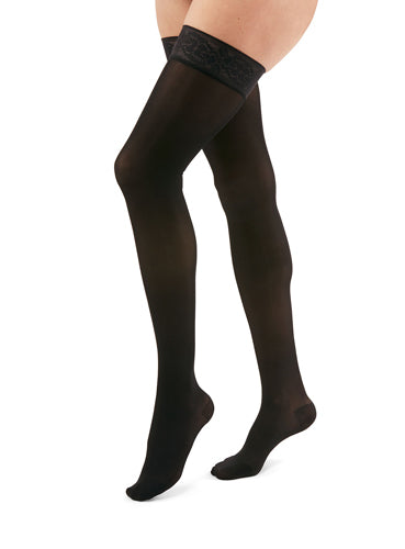 Woman wearing her Duomed Transparent Thigh High Compression Stockings in the color Black