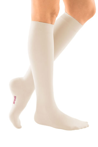 Female leg showcasing the Mediven Comfort Closed Toe Knee High in the color Wheat