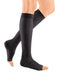 Woman wearing her Mediven Sheer and Soft Open Toe 30-40 mmHg Compression Stockings in the color Ebony