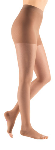 Lady wearing her Mediven Sheer and Soft Waist High Compression Pantyhose in the Color Natural
