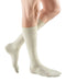 Male wearing Mediven for Men Classic Ribbed Dress Sock | 20-30 mmHg Compression in the Color Tan
