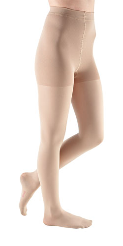 Woman wearing her Mediven Comfort Compression Pantyhose in the color Sandstone