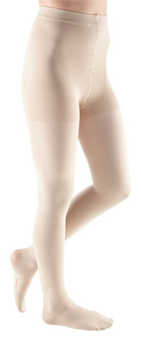 Woman wearing her Mediven Comfort Compression Pantyhose in the color Wheat