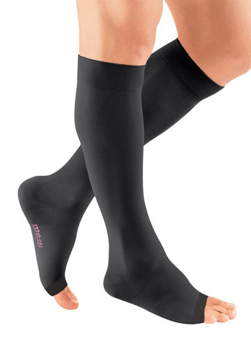 Male wearing his Mediven Plus Open Toe Knee High 20-30 mmHg Compression Stockings in the color Black