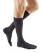 Man wearing his Mediven for Men Select Dress 15-20 mmHg Compression Socks in the Color Grey