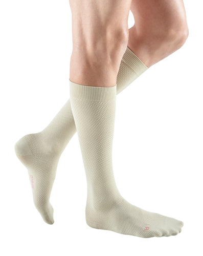 Guy wearing his Mediven for Men Select Dress Compression Socks 20-30 mmHg in the color Tan