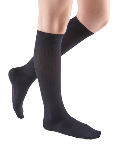 Lady wearing her Mediven Comfort Vitality Dress Sock 30-40 mmHg | Color Ebony