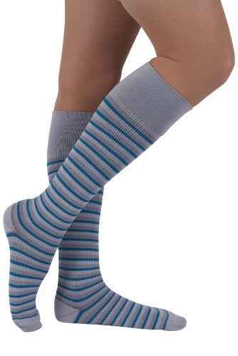 Lady wearing her Rejuva Gray and Teal Compression Socks